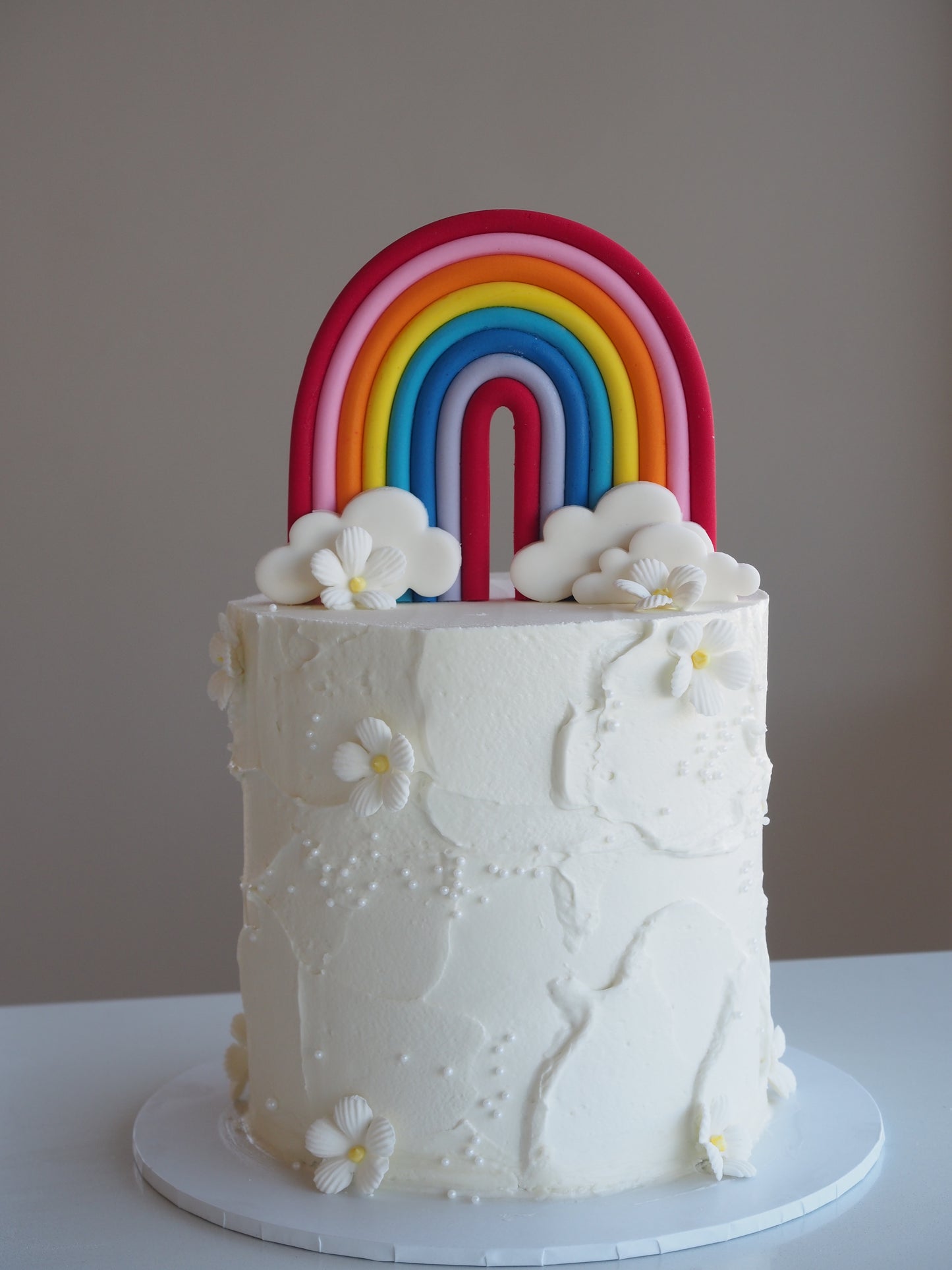 Fondant rainbow cake topper