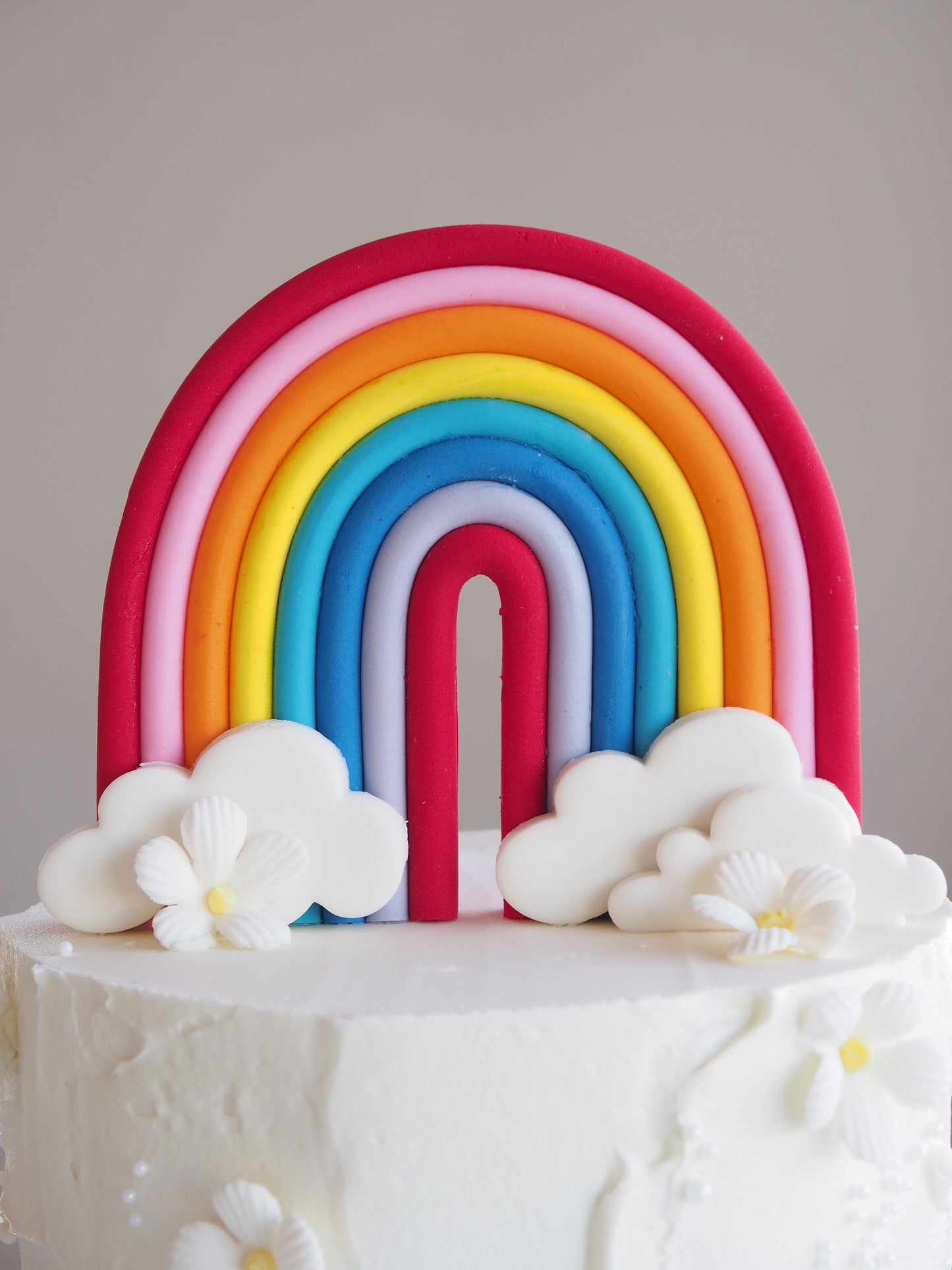 Fondant rainbow cake topper